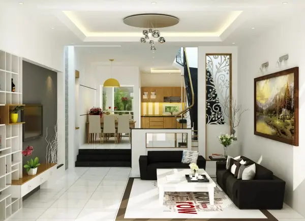 Phòng khách kết nối với phòng ăn sang trọng và hiện đại, có cầu thang dẫn lên tầng.