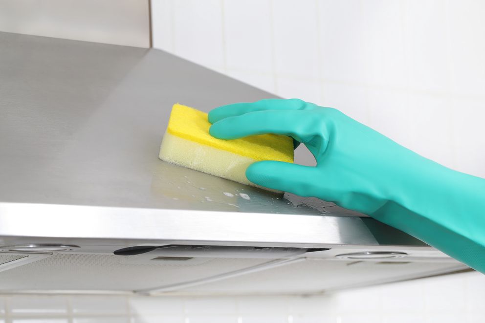 Step 1: using sponge to clean cooker hood